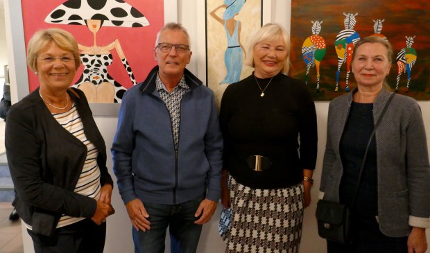 De exposanten en wethouder van Weel