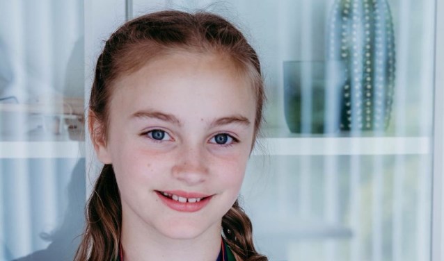 Elise met haar vier medailles.