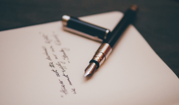 Pen met gedicht