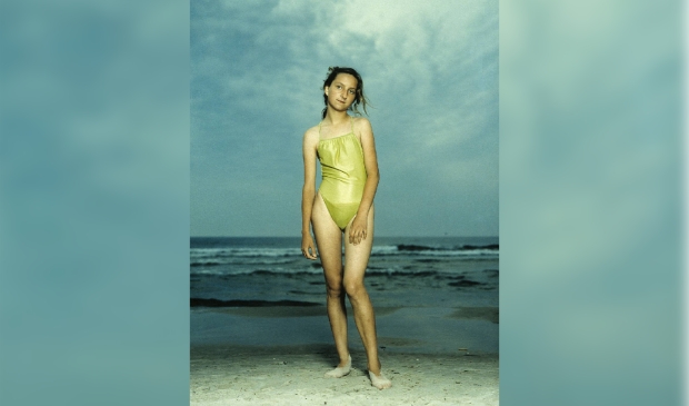 girl standing on a beach