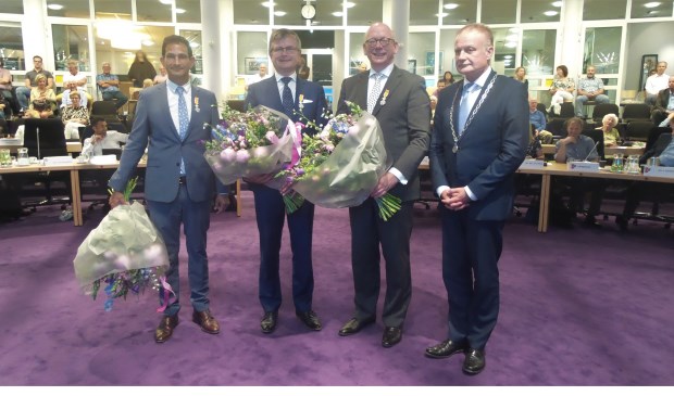 Maarten Hoelscher, Bert Rebel en Kees de Kok kregen een koninklijke onderscheiding van burgemeester Heldoorn.