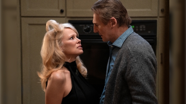 Pamela Anderson plays Beth and Liam Neeson plays Frank in The Naked Gun from Paramount Pictures.