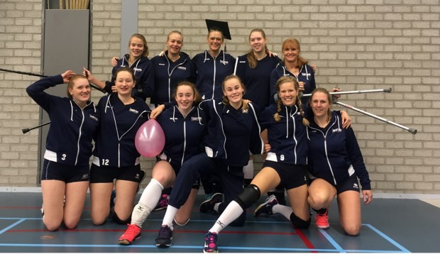Het team, met middenin de professor.
