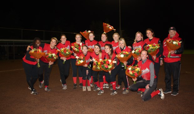 Bloemen voor het kampioensteam.