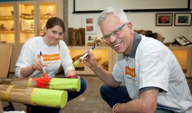 Tijdens NL Doet steken vele vrijwilligers de handen uit de mouwen.