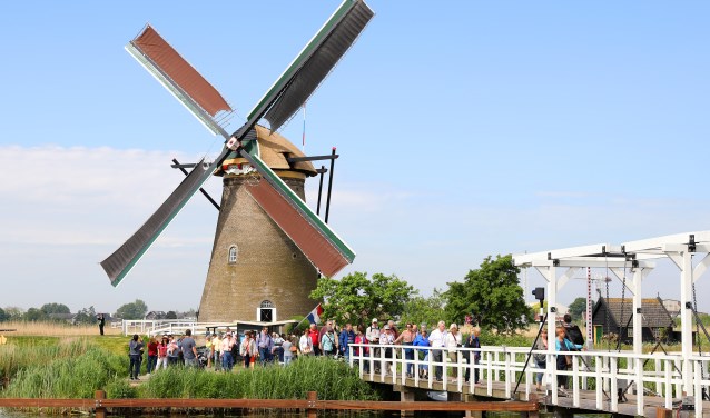 • Toeristen in Kinderdijk (archieffoto).