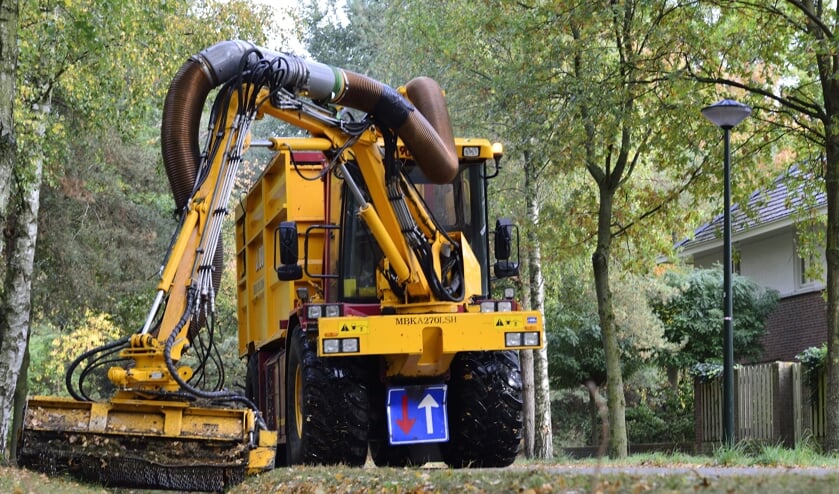De 'oude' bladzuigmachine in actie | Fotonummer: f36493