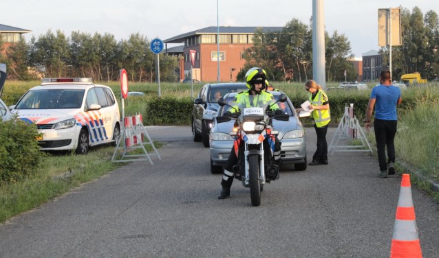 Met behulp van ANPR camera's pikten motorrijders van de politie auto's van de weg en lieten deze controleren. Foto: Jan van Es