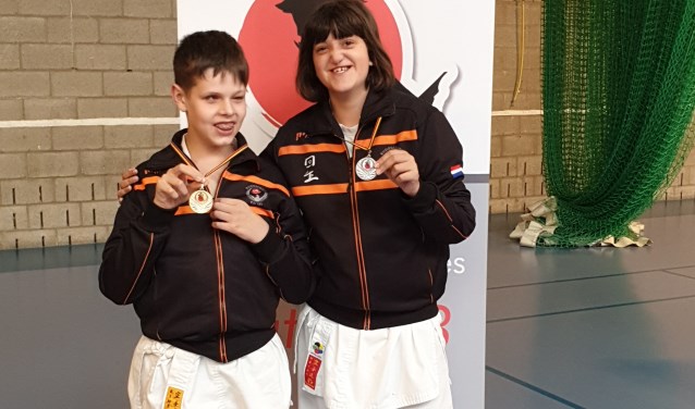 Een gouden medaille voor Michaël en een zilveren medaille voor Elise. Foto: pr