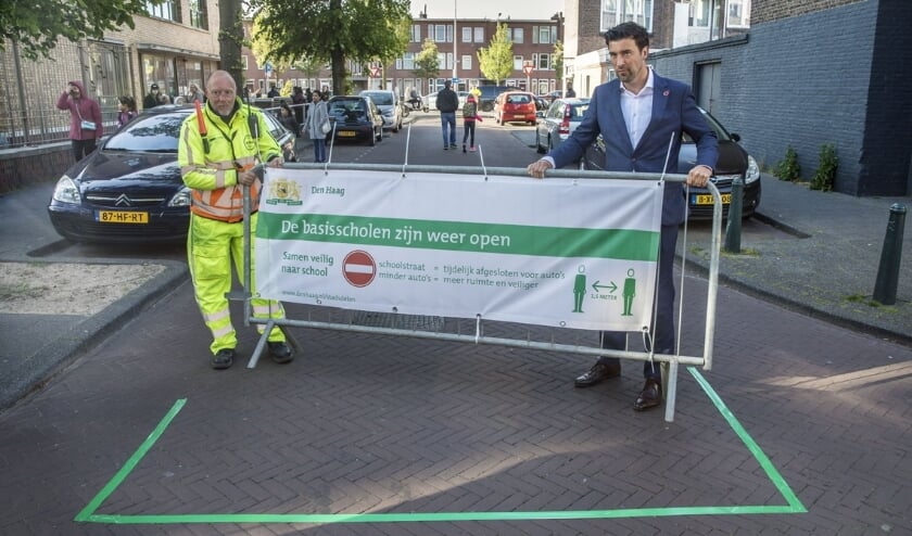 <p>Help kinderen veilig naar school. Foto: Gemeente Den Haag<br><br></p>