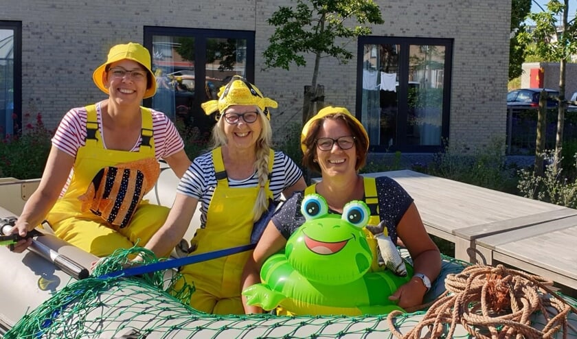Het organisatieteam in een vrolijke uitdossing.