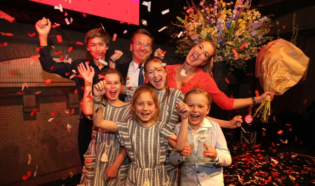 Laura (rechtsboven) met haar familie.