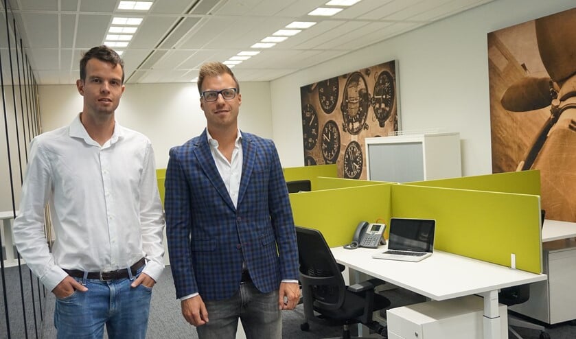 Jeroen Voorn (rechts), directeur van Vastelastenbesparing.nl