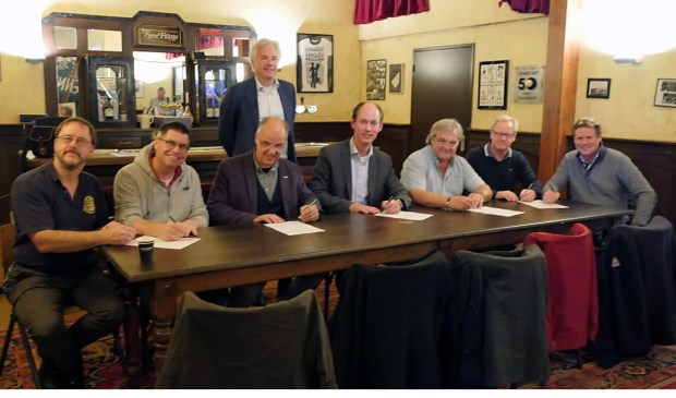 De ondertekenaars van het convenant.
