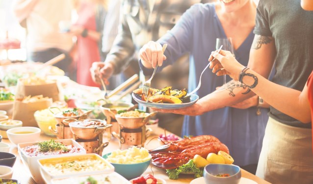 Foto: Wie komt er allemaal gezellig eten? FOTO SHUTTERSTOCK