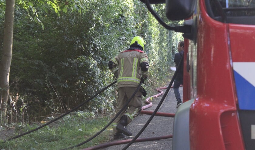 Snoeihout in brand aan de Reijersweg