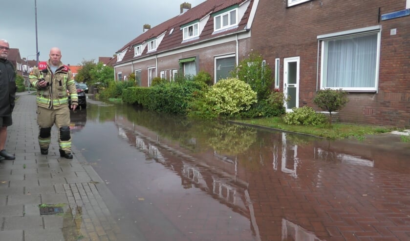 Vannacht straten en huizen onder water gelopen in de wijk Middengebied