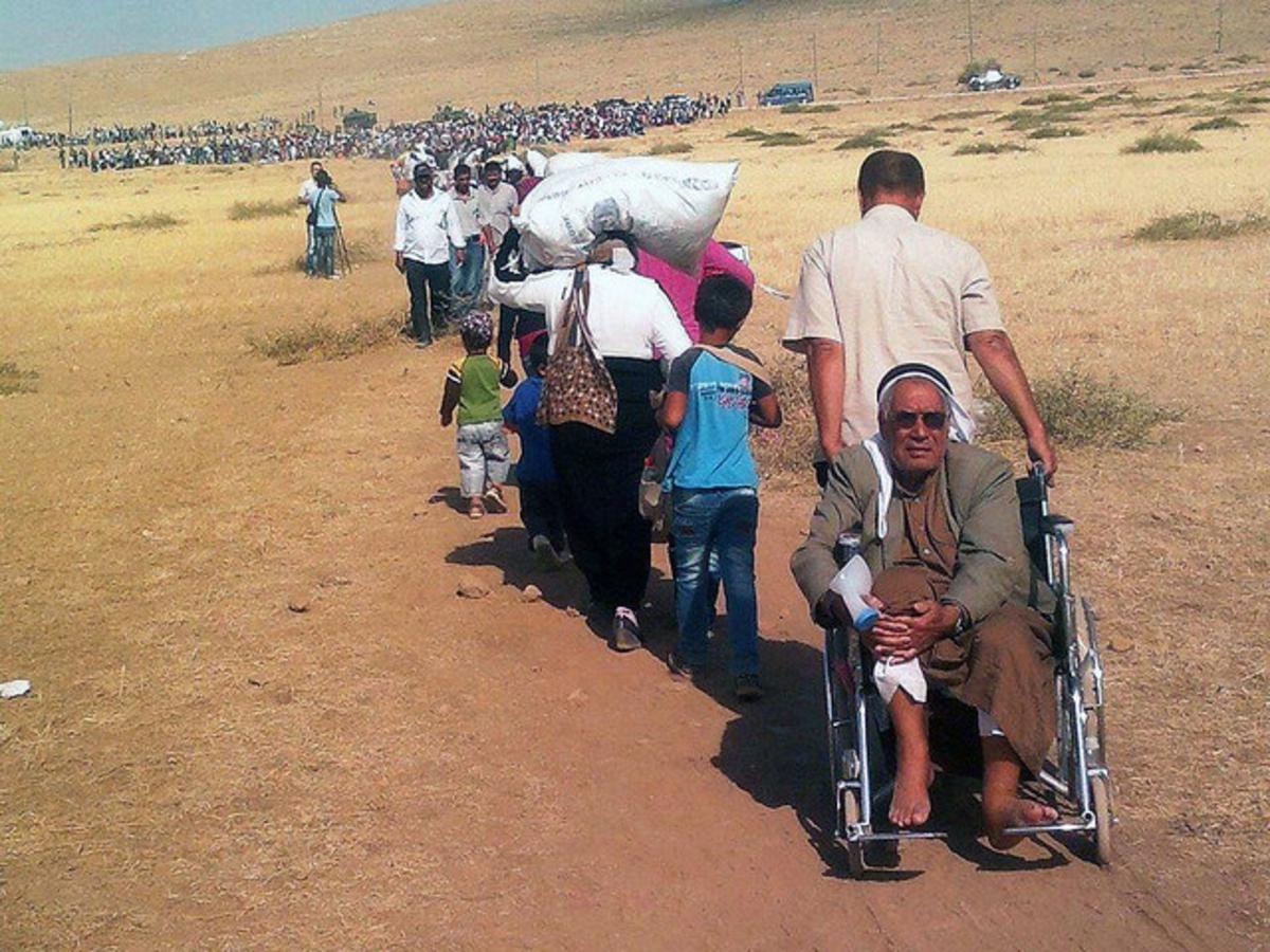 Vluchtelingen bij de Turkse grens met Irak