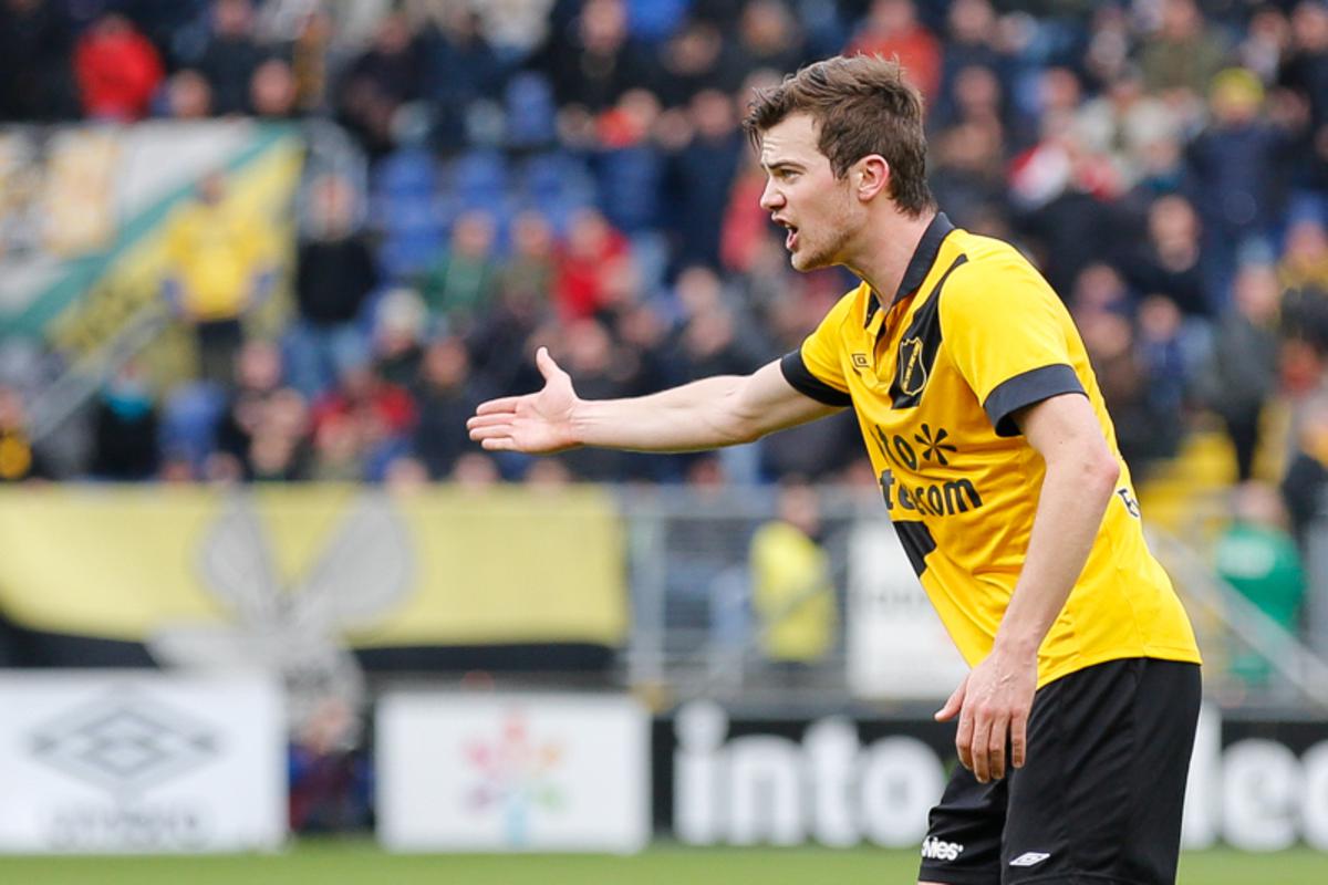 NAC gaat strijdend ten onder tegen Feyenoord op 21 december 2014. Het werd 0-1.
