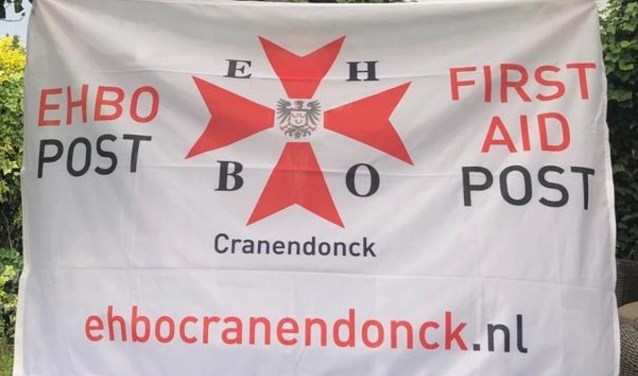 Vlag voor bij EHBO post