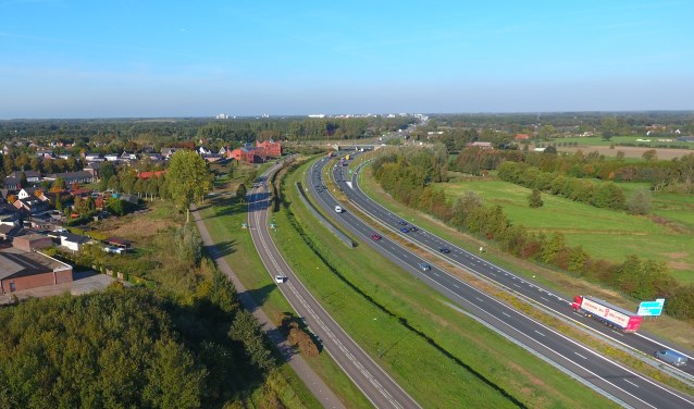 Links Rooi met in de verte Veghel. | Fotonummer: 8a3635