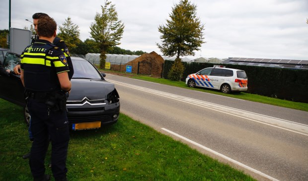 Politie op de plaats waar de kopstaart-aanrijding woensdagmiddag plaatsvond. Foto: SK-Media