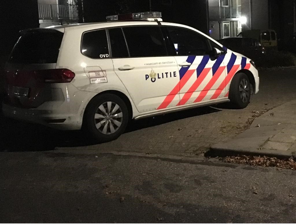 De politie bij één van de plekken waar een overval werd gepleegd.