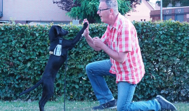 Maylo geeft een high five aan baas Jan.