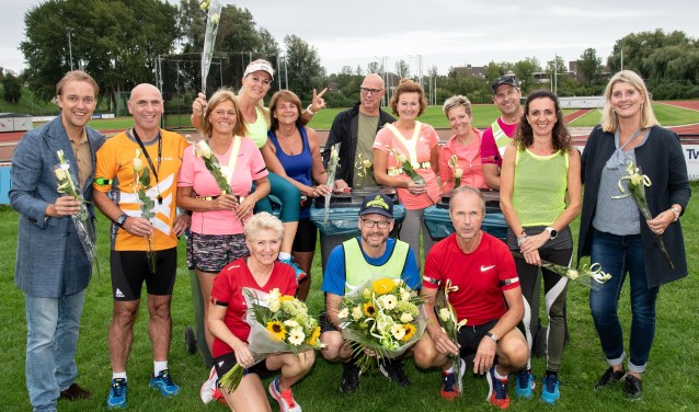 Bloemen en complimenten voor de ploggers van Energie.
