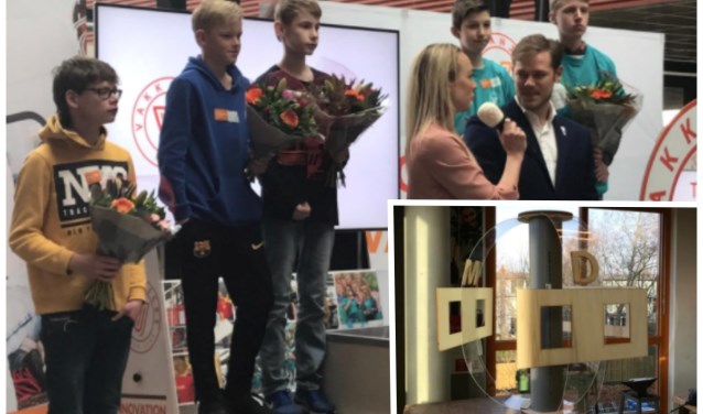 Links het Fioretti-team, bestaande uit Tim, Danny en Dennis, dat de tweede plek behaalde. Rechtsonder de klok.
