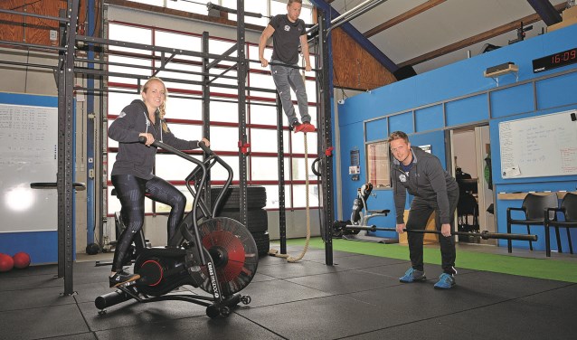 Sacha, Martijn en Maarten in de sportschool aan de Abbewaal.